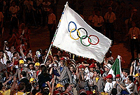 Celebrating the Olympic flag
