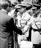 Generals Pattakos (middle) and Papadopoulos (right) with King Constantine