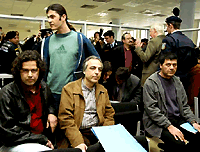 Xiros Savvas, Dimitris Koufodinas, Christodoulos Xiros and Vasilis Xiros (standing) during the N17 trial