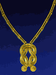 Ожерелье в 22 карата золота с кулоном «узел Геракла», коллекция «Классика Эллинизма» (1957) - Музей драгоценностей Илиаса Лалауниса